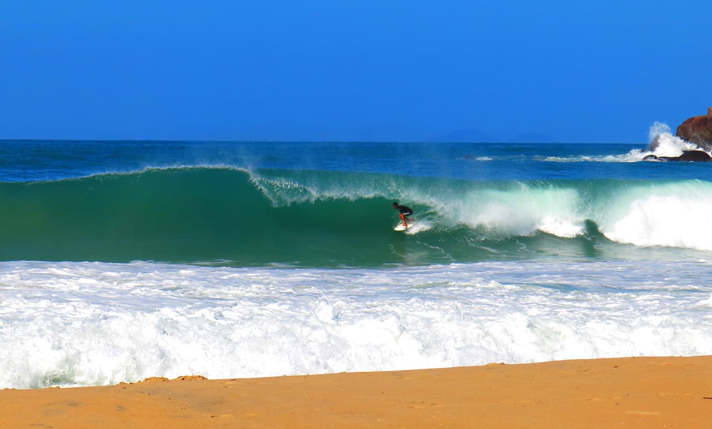 Surfing at Ubatuba (Praia Grande), São Paulo, Brazil