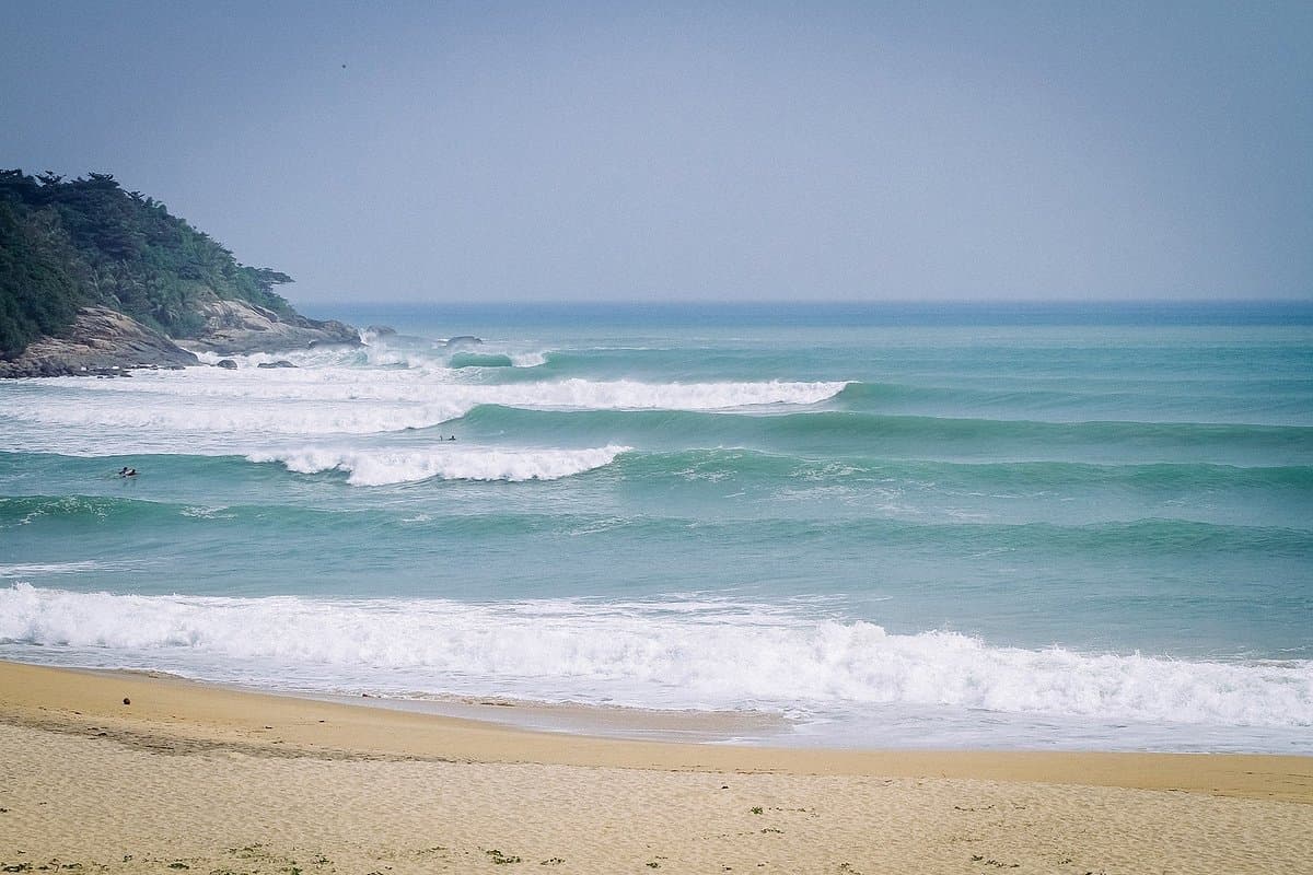 Surfing at Riyue Bay (Sun Moon Bay), Wanning, Hainan, China