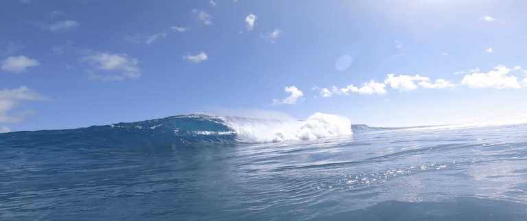 Surfing at Avaavaroa Passage, Rarotonga, Cook Islands