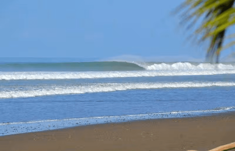 Surfing at Dominical, Dominical, Costa Rica