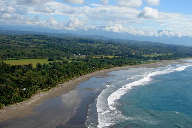 Surfing at Esterillos Este, Esterillos, Costa Rica