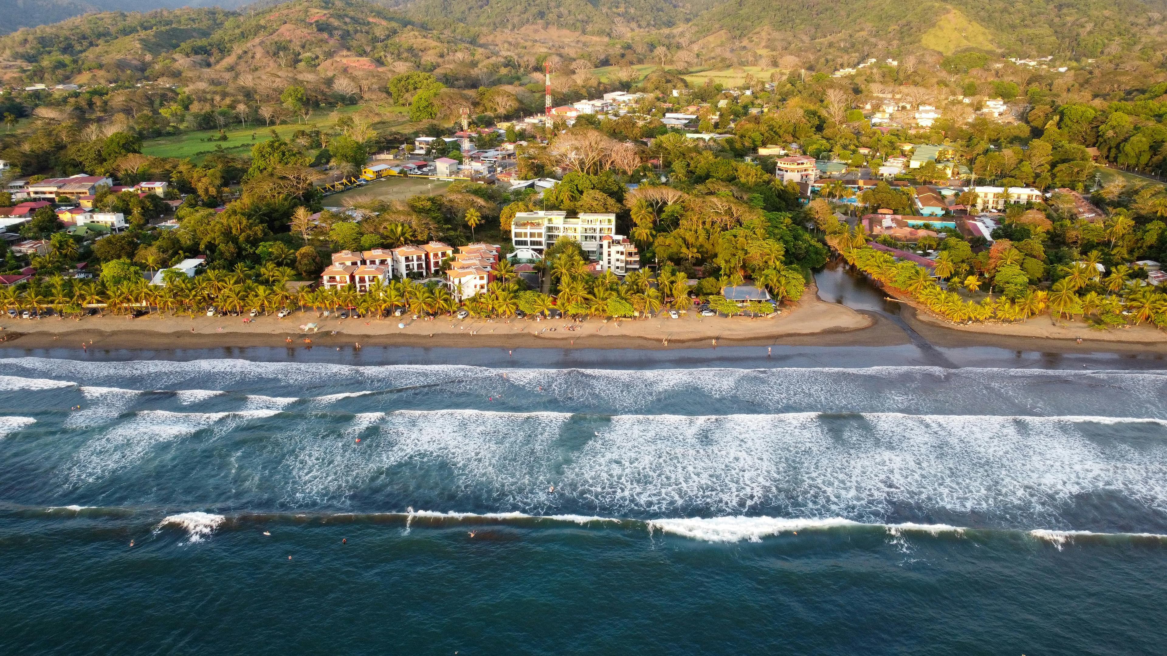 Surfing at Jaco Beach, Jaco, Costa Rica
