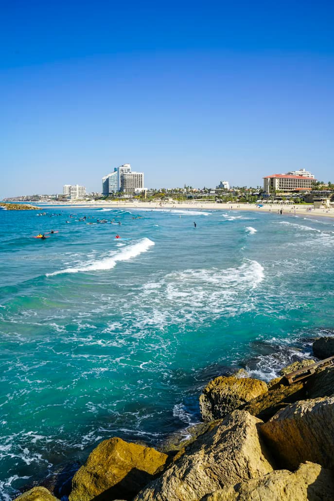 Surfing at Herzliya Beach, Herzliya, Israel