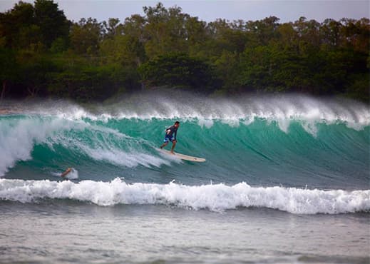 Surfing at Tamarin Bay, Black River, Mauritius