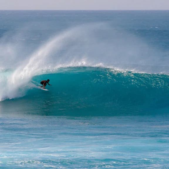 Surfing at Waikiki Beach, Oahu, USA
