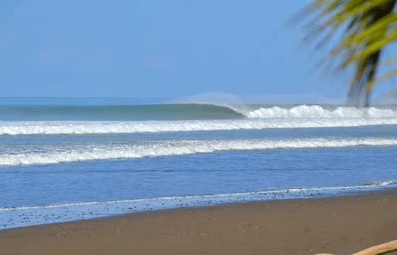 Surfing at Dominical, Dominical, Costa Rica