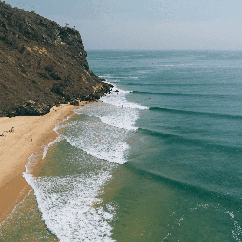 Surfing at Cabo Ledo, Bengo, Angola