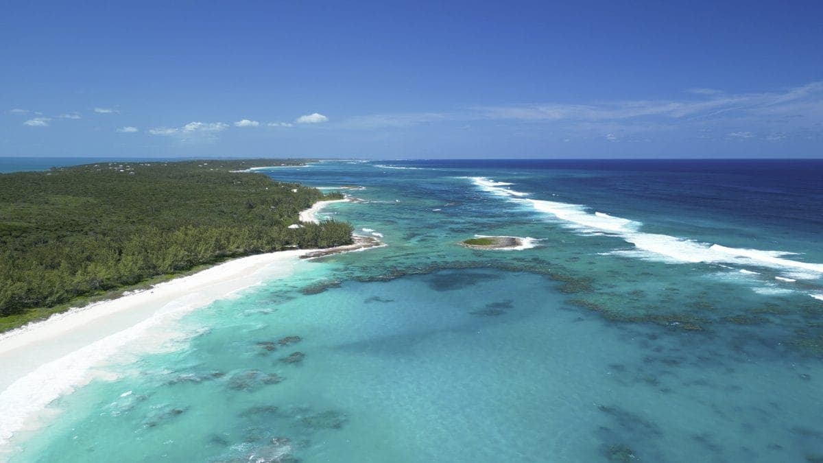 Surfing at Taino Beach, Grand Bahama, Bahamas
