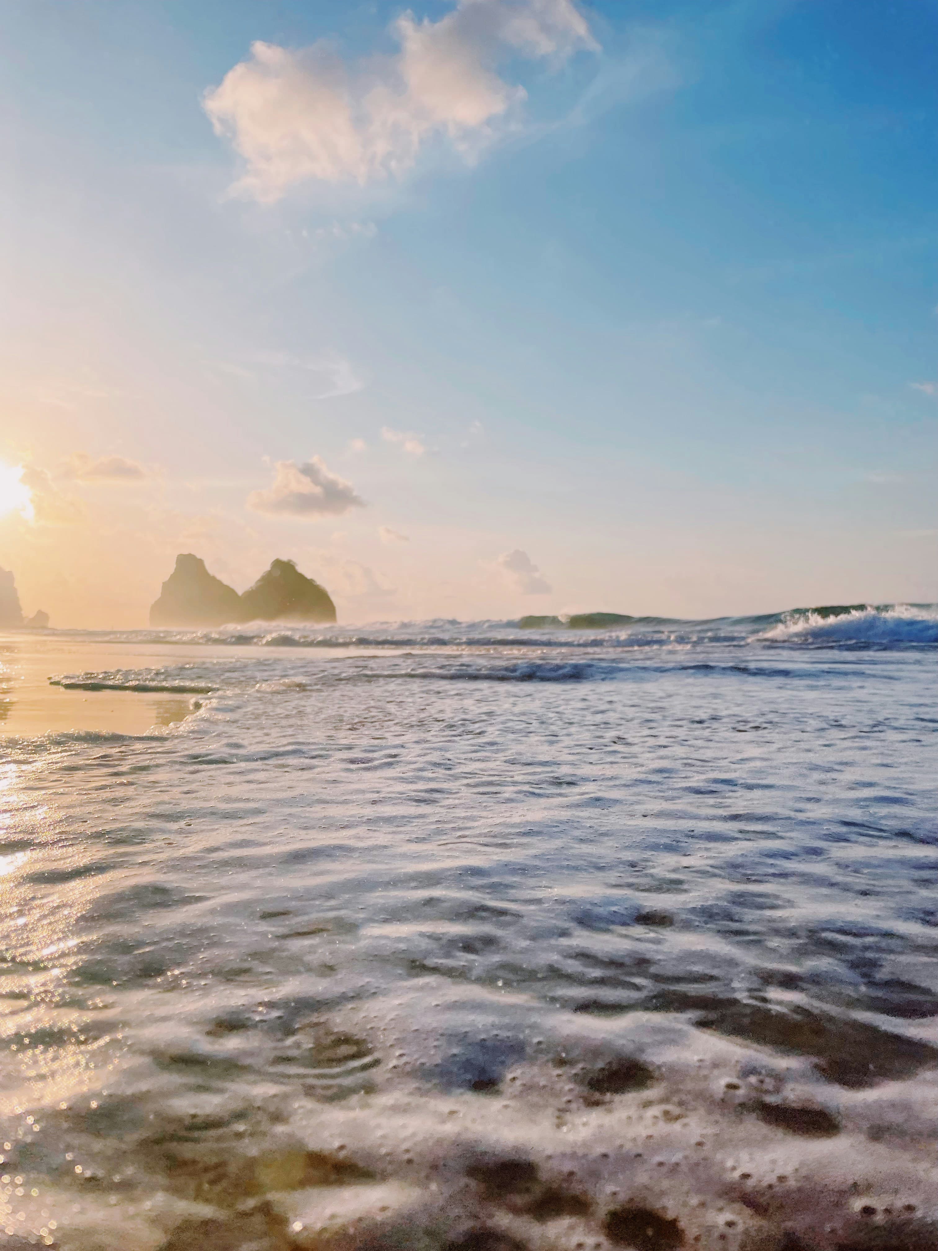 Surfing at Fernando de Noronha (Cacimba do Padre), Pernambuco, Brazil