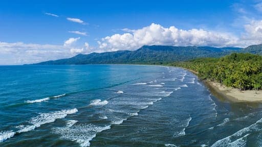 Surfing at Boca Barranca, Puntarenas, Costa Rica