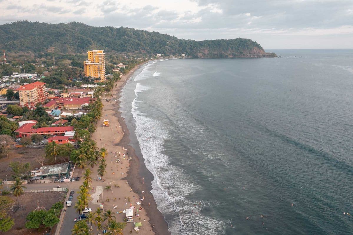 Surfing at Playa Hermosa Jaco, Jacó, Costa Rica