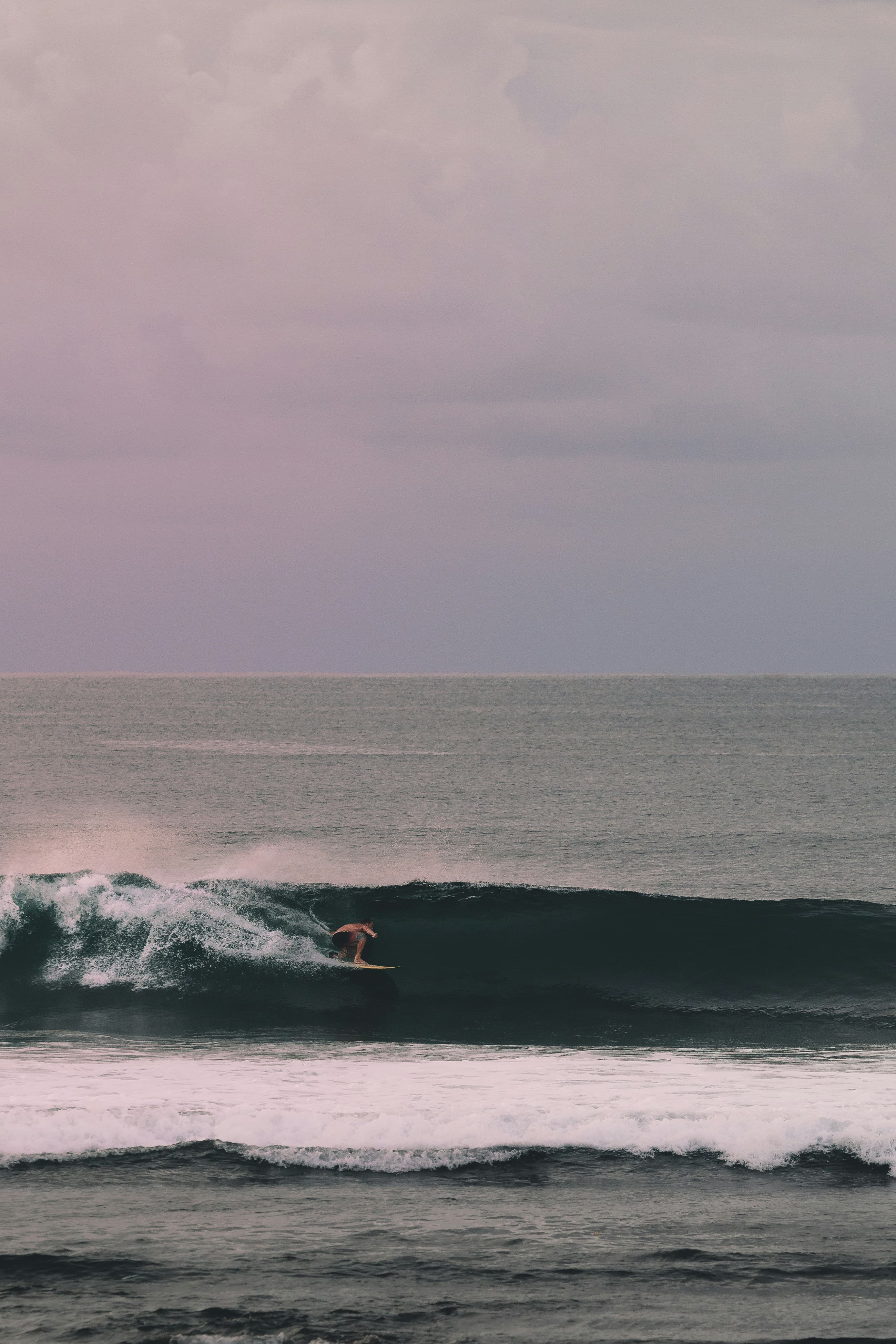 Surfing at Balangan, Bali, Indonesia