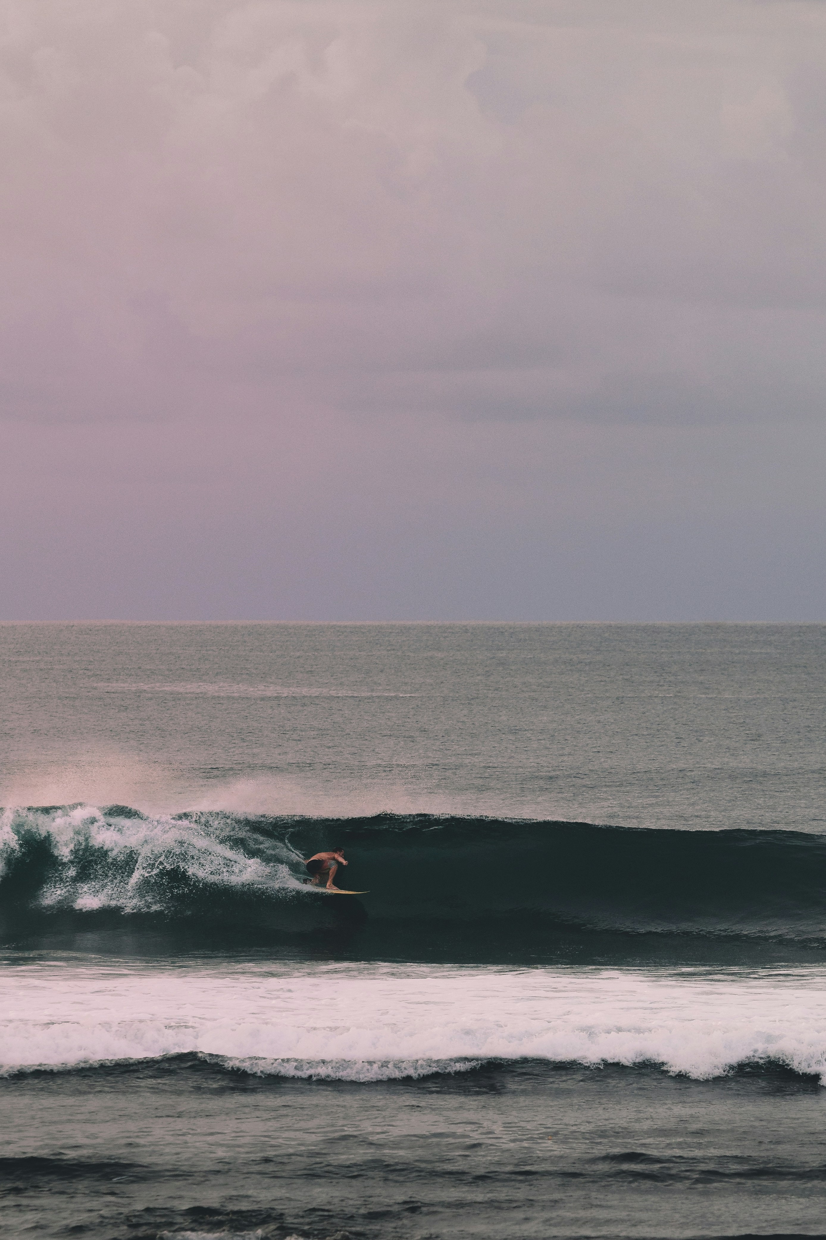 Surfing at Balangan, Bali, Indonesia