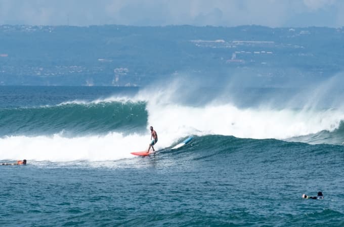 Surfing at Canggu (Batu Bolong), Bali, Indonesia