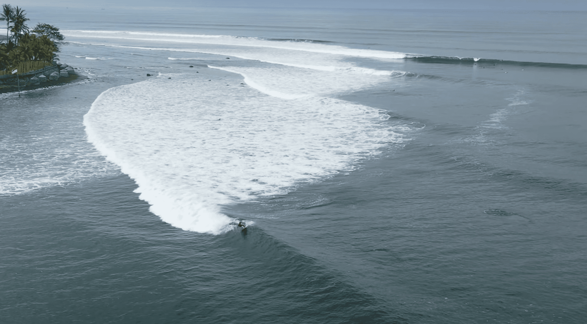 Surfing at Medewi, Bali, Indonesia