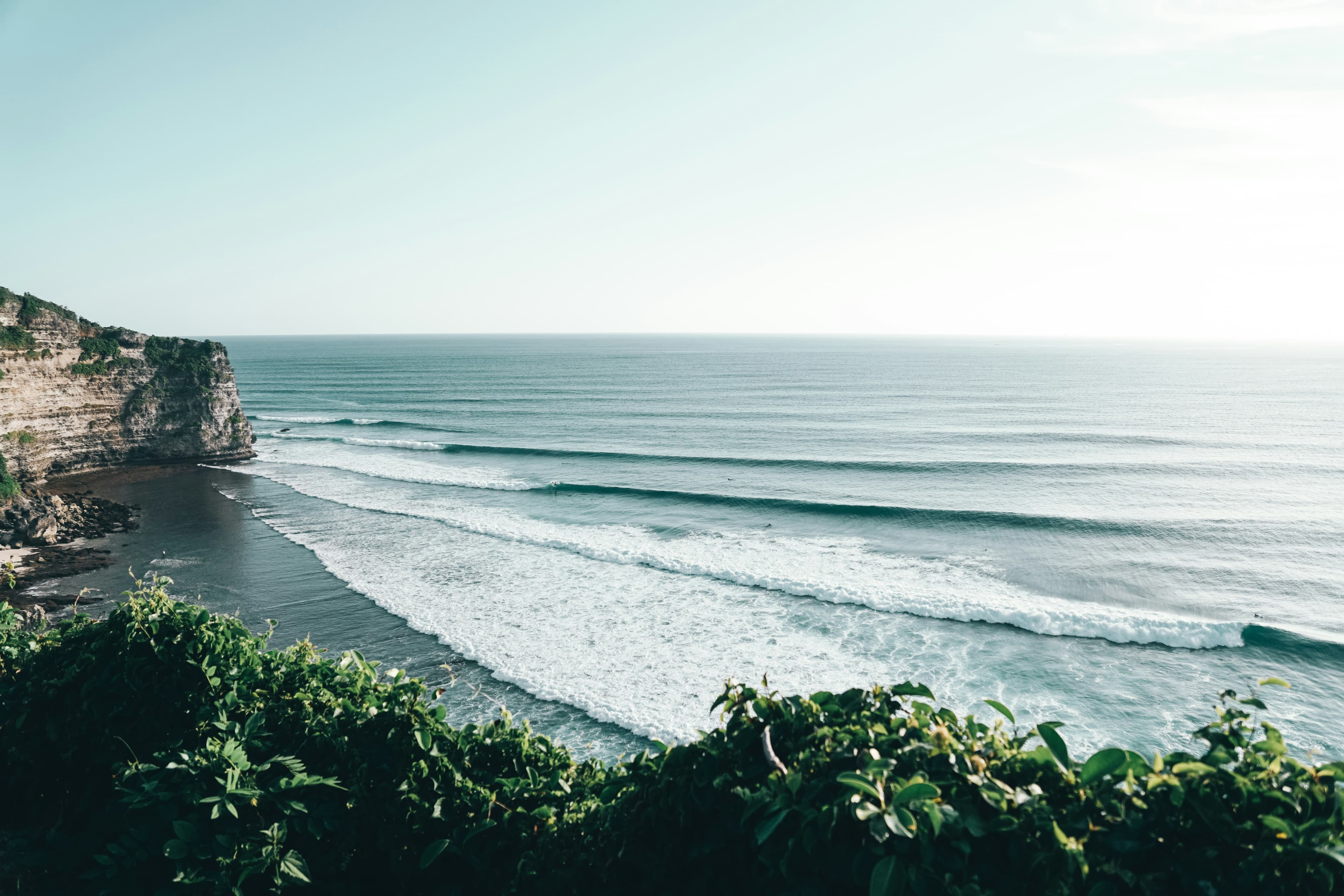 Surfing at Uluwatu, Bali, Indonesia