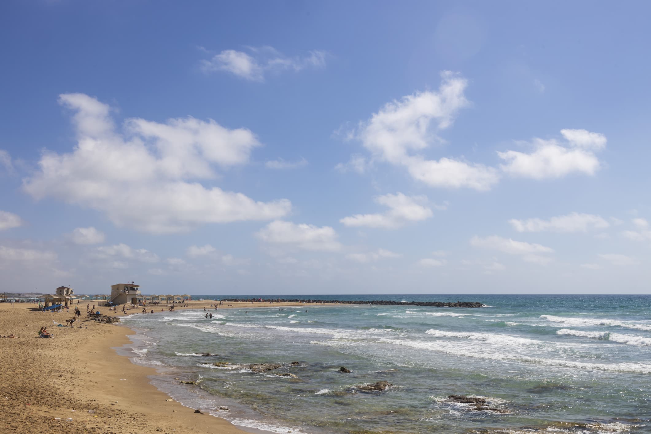 Surfing at Dado Beach, Haifa, Israel