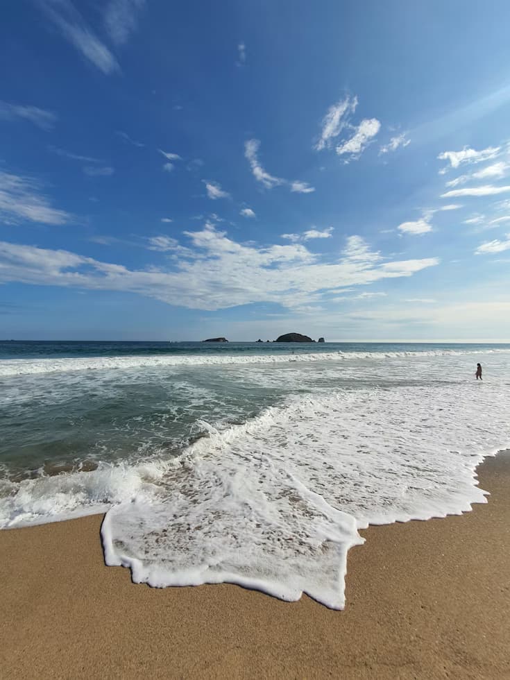 Surfing at Playa Linda (Zihuatanejo), Guerrero, Mexico