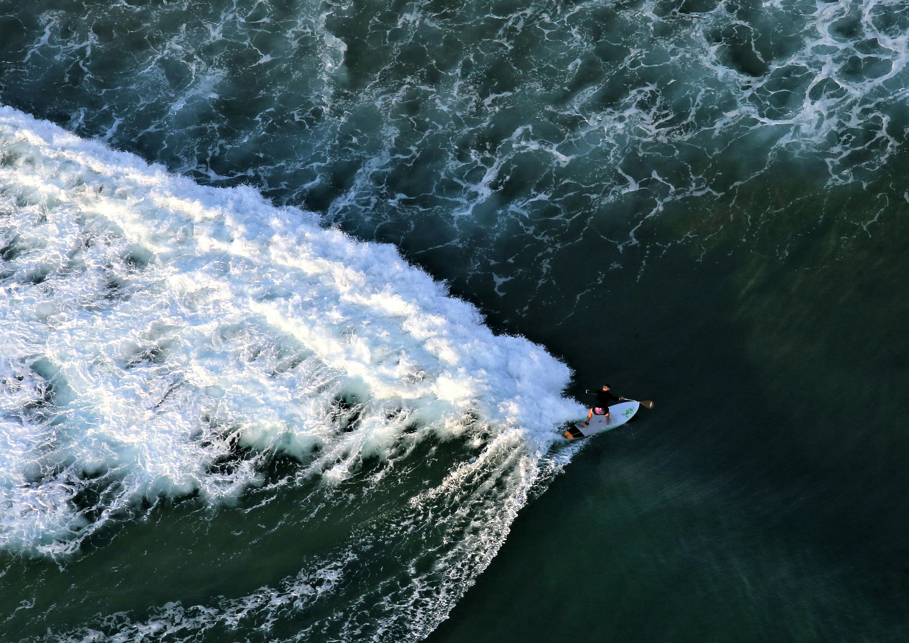 Surfing at Ponta d'Ouro, Maputo, Mozambique