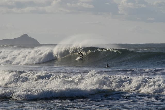 Surfing at Mount Maunganui, Bay of Plenty, New Zealand