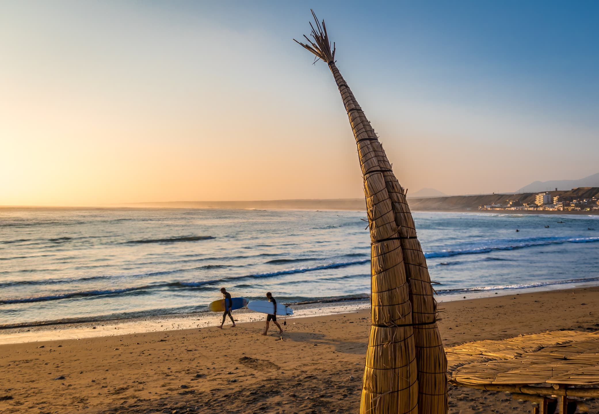 Surfing at Pacasmayo, La Libertad, Peru