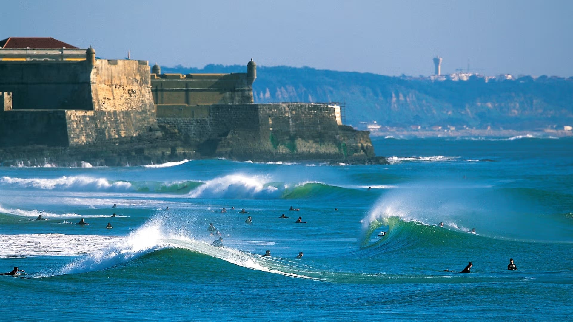 Surfing at Carcavelos, Lisboa, Portugal