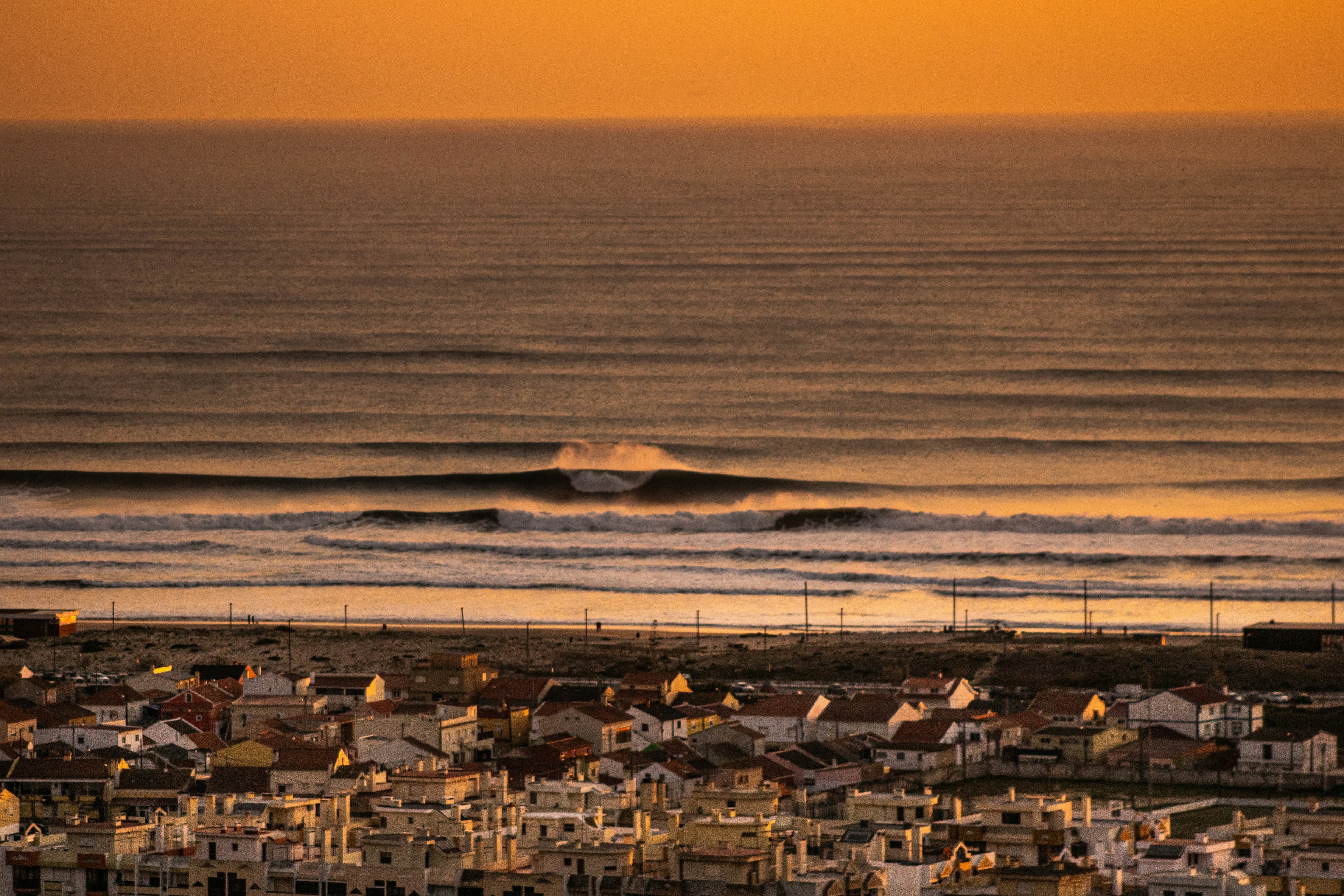 Surfing at Costa da Caparica, Lisboa, Portugal