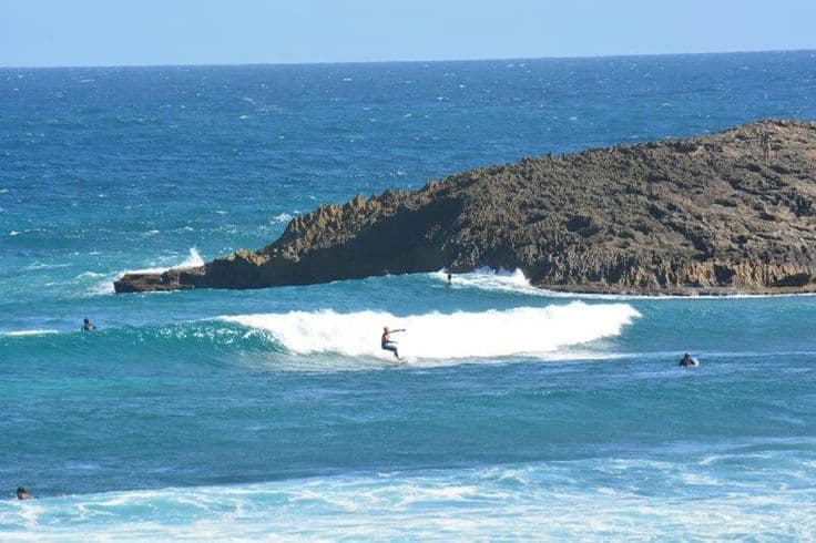 Surfing at Jobos Beach, Isabela, Puerto Rico