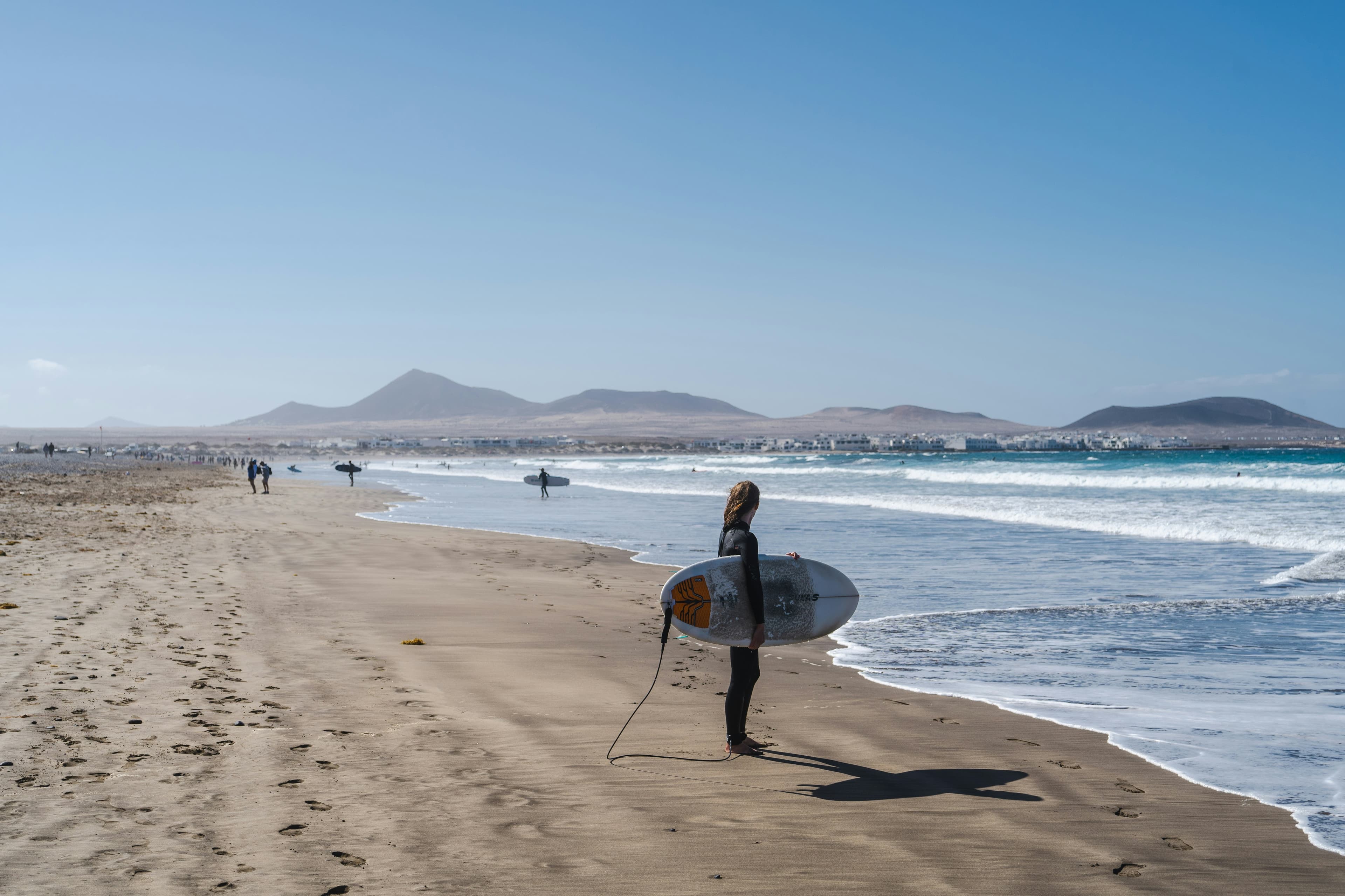 Surfing at Famara, Lanzarote, Spain