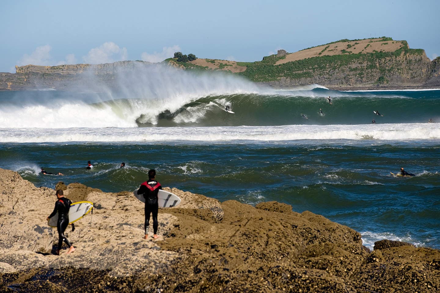 Surfing at Mundaka, Euskadi, Spain