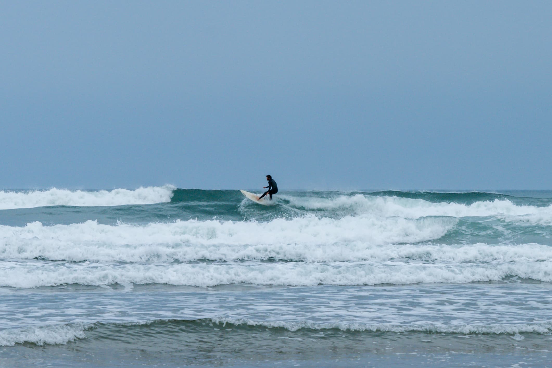 Surfing at Rodiles, Asturias, Spain